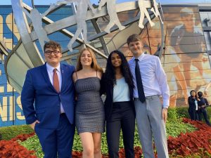 A photo of young people dressed in business attire.